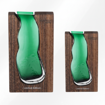 Two green glass vases in wooden holders with 'Mambo' branding on a white background.